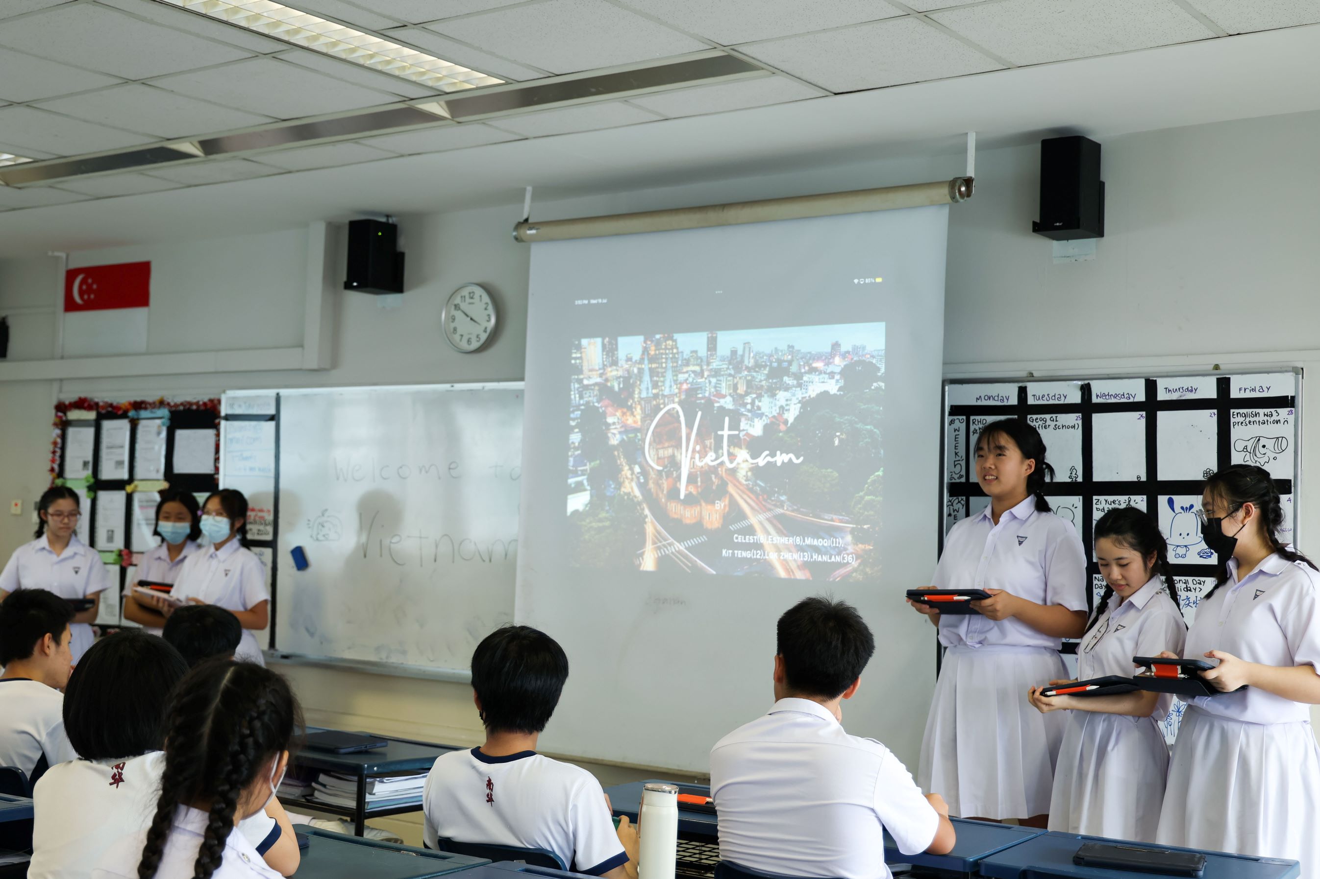 Presenters engaging their peers on Vietnam